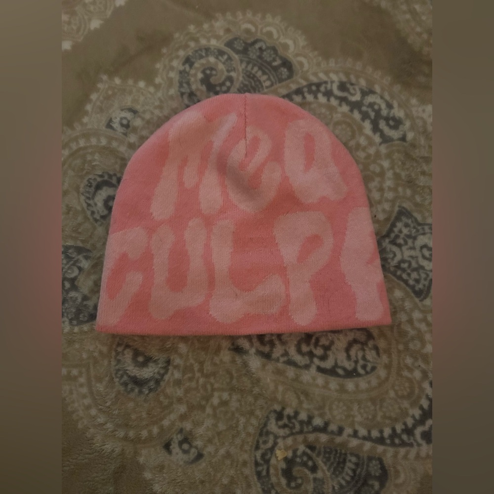 Mea Culpa beanie, shades of pink.